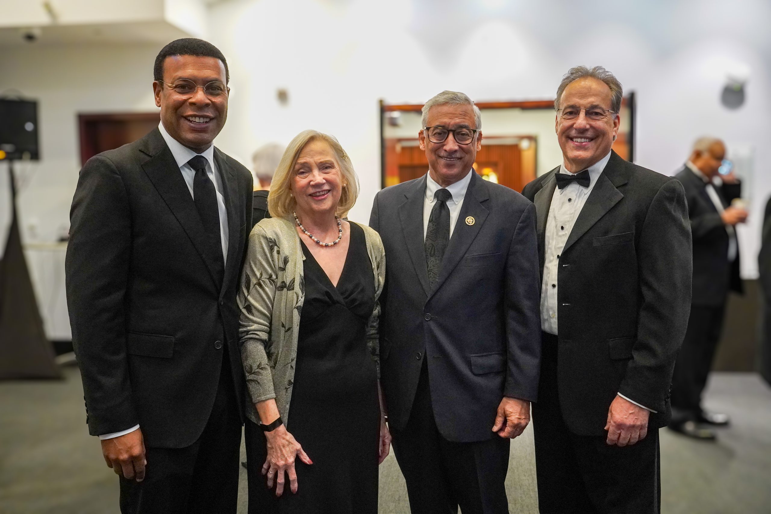 group photo with mayor alexander, board president thelma drake, congressman bobby scott, and ceo steve zollos