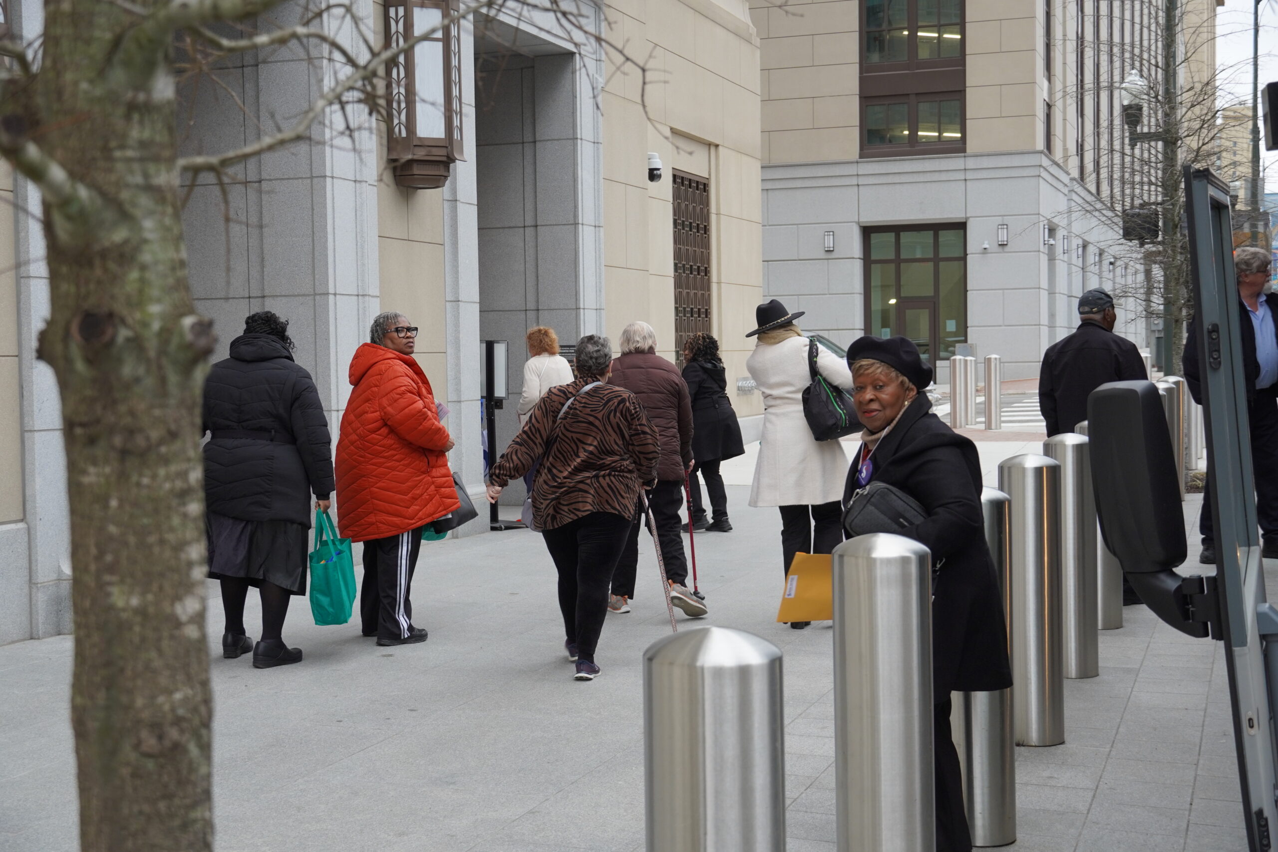 group of seniors walking into the General Assembly Building