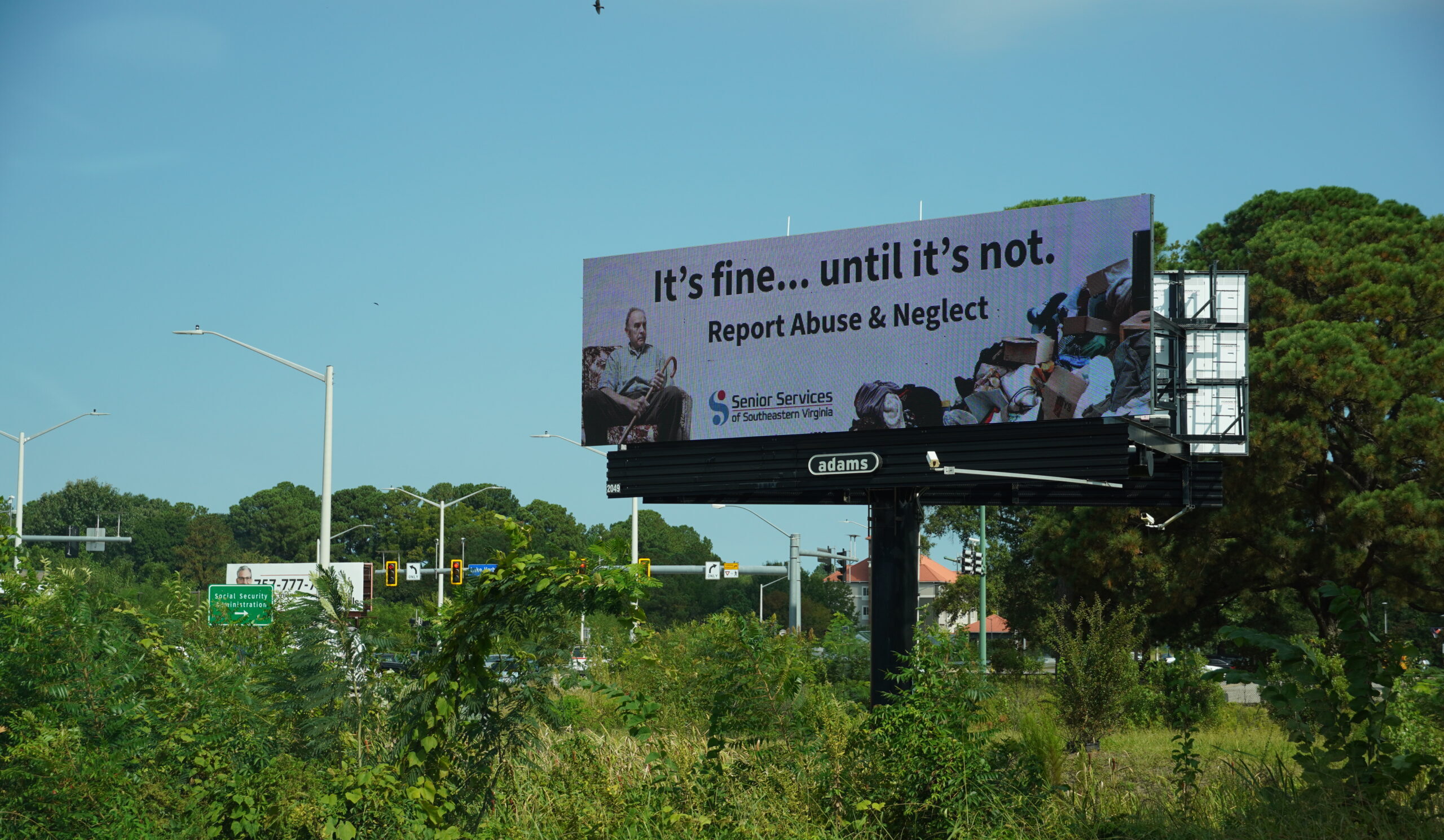 Image of billboard next to street