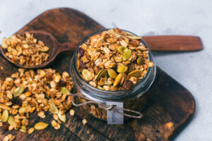 granola mix, pepitas, oats, raisins, dried cranberries