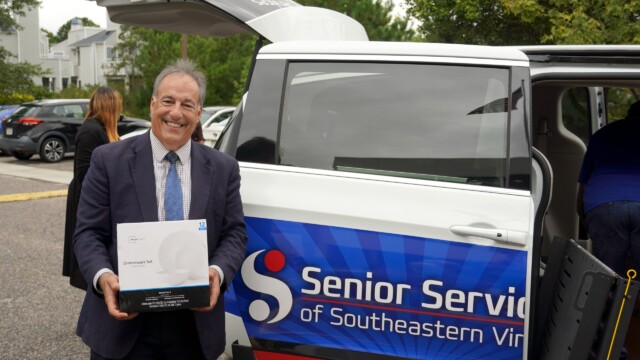 Steve Zollos with donation