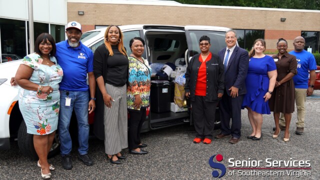Senior Services and Bryant & Stratton with Donation Bus