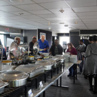 group of volunteers getting lunch