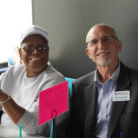 two people smiling